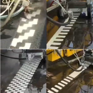 The driving hot melt extrusion marking machine is being used